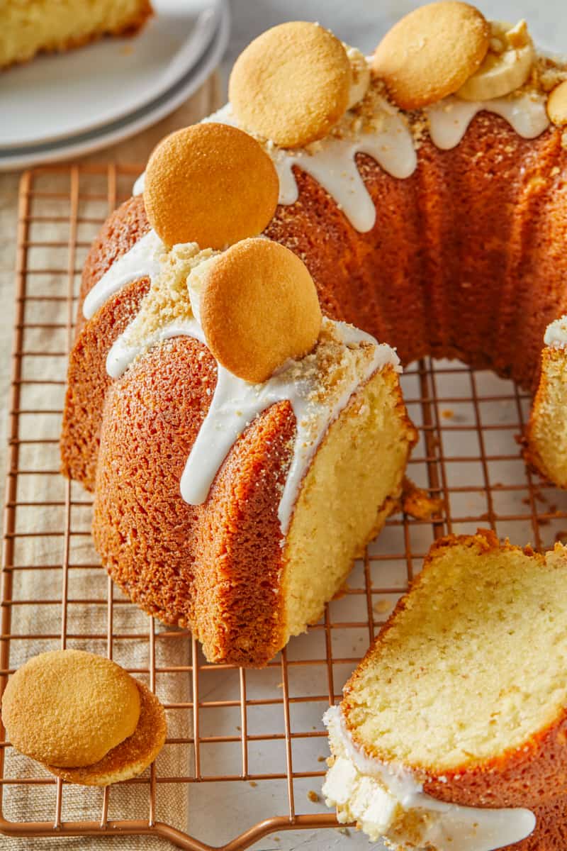 A close up of a banana pudding pound cake sliced and ready to serve
